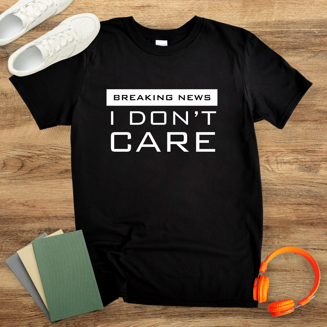 Breaking News, I Don't Care Unisex Softstyle T-Shirt