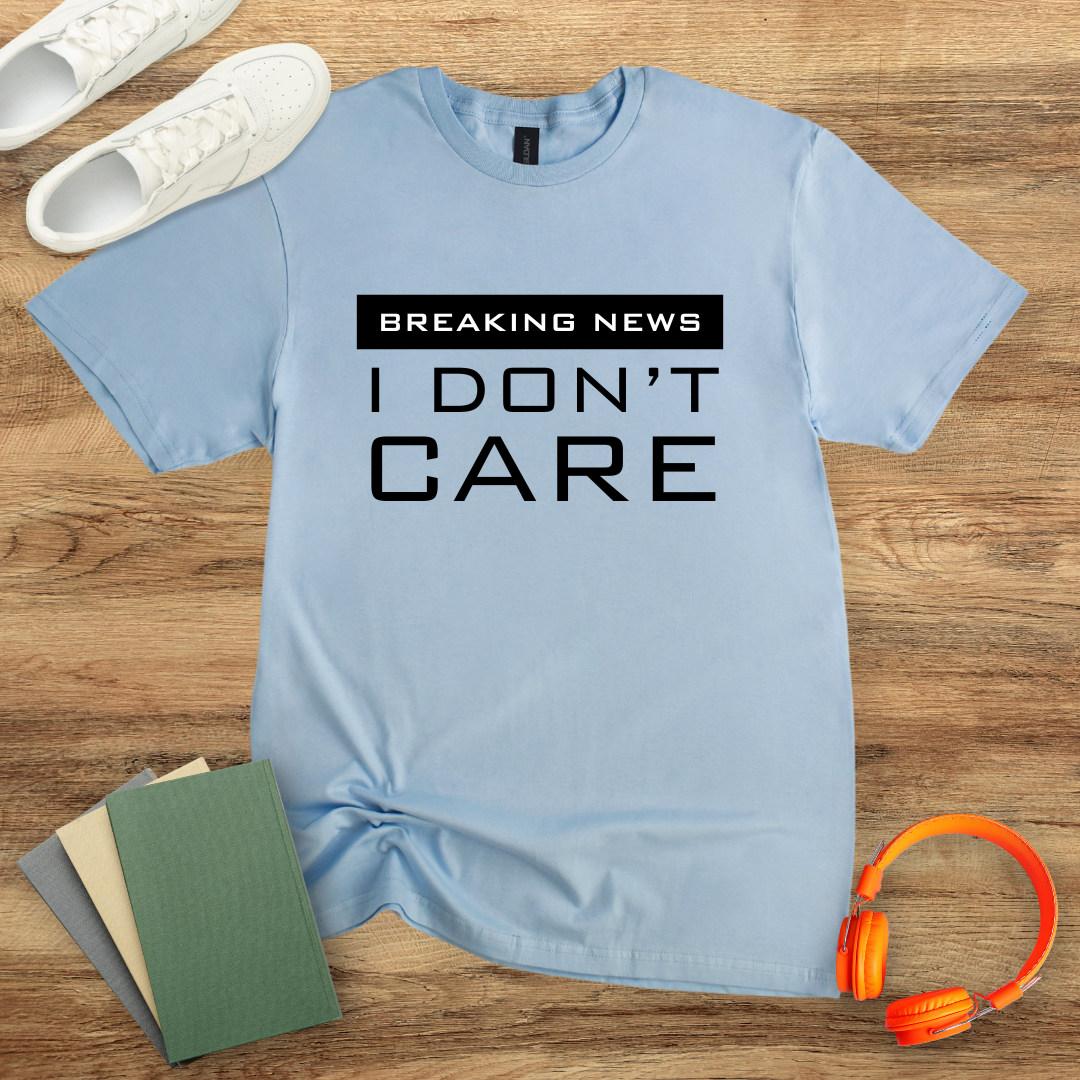Breaking News, I Don't Care Unisex Softstyle T-Shirt