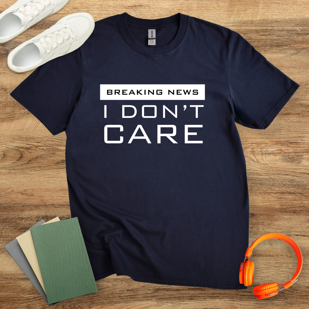 Breaking News, I Don't Care Unisex Softstyle T-Shirt